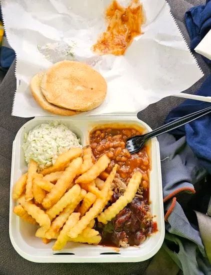 A barbecue plate to go with crinkle fries, coleslaw, baked beans and a bun